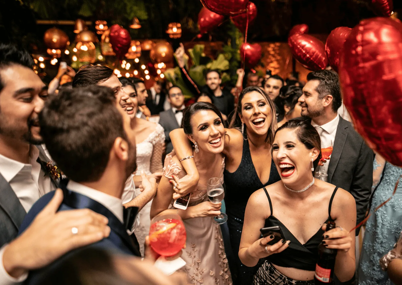 Party guests cheering at a lively appreciation event