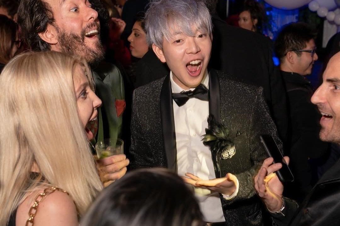 Johnny Wu performing close up magic for guests