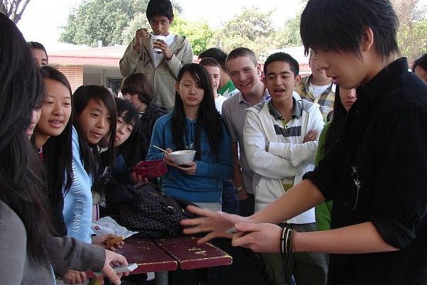Johnny Wu performing close up magic for guests