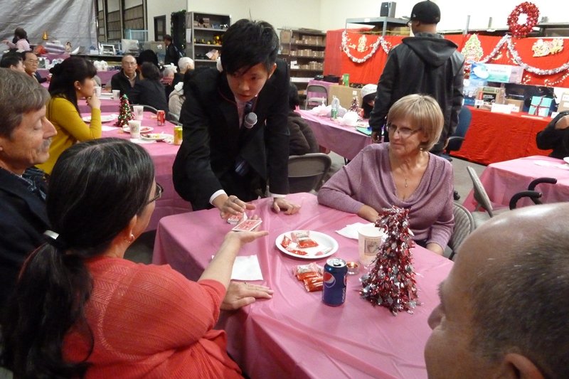 Johnny Wu performing close up magic for guests