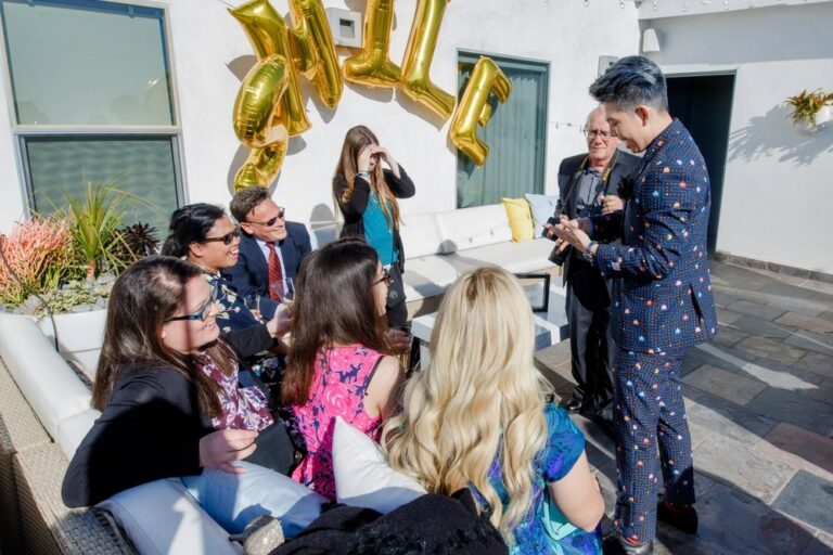 Johnny Wu performing magic at a private birthday party