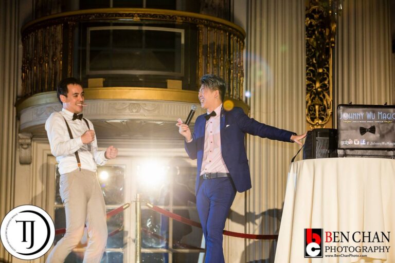 Johnny Wu performing on stage at a gala