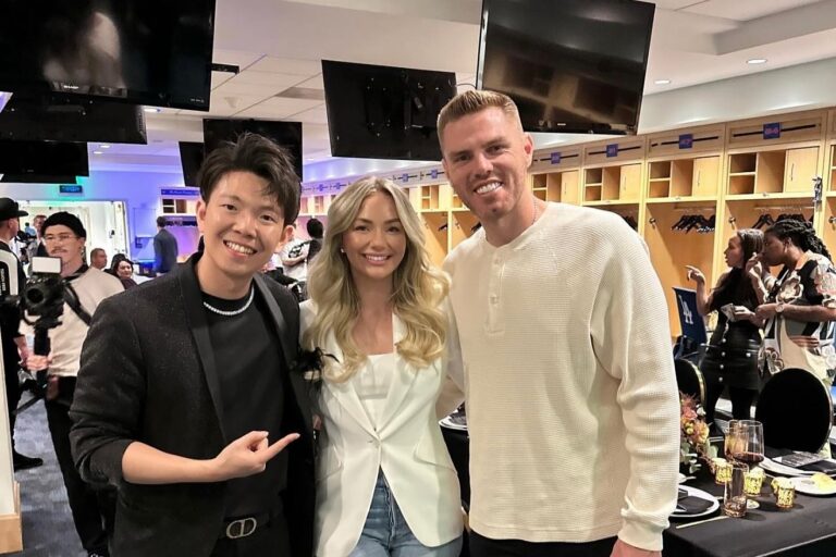 Johnny Wu with a celebrity guest after a private event