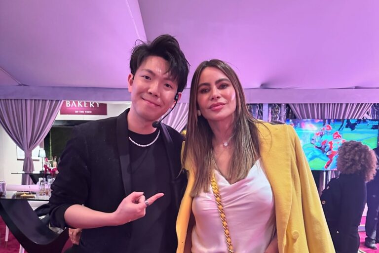 Johnny Wu with a celebrity guest after a private event