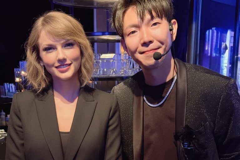Johnny Wu with a celebrity guest after a private event