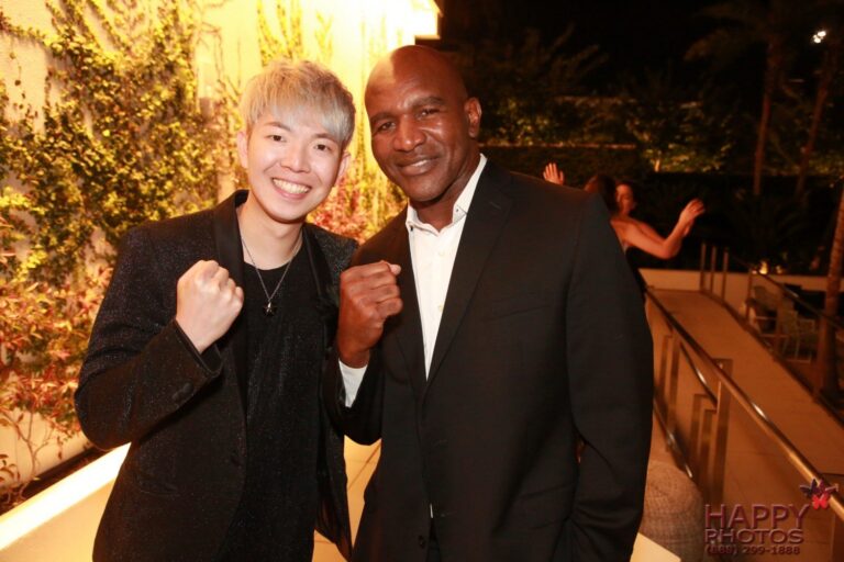 Johnny Wu with a celebrity guest after a private event