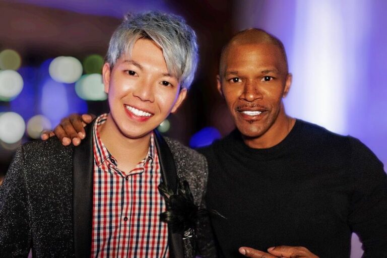 Johnny Wu with a celebrity guest after a private event