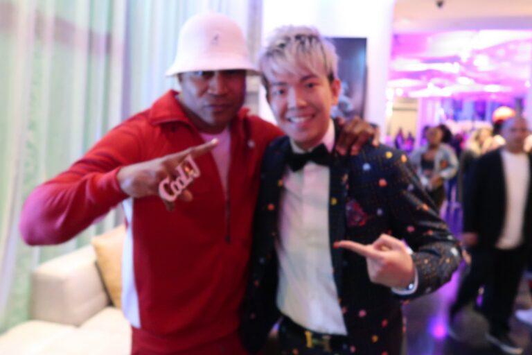 Johnny Wu with a celebrity guest after a private event