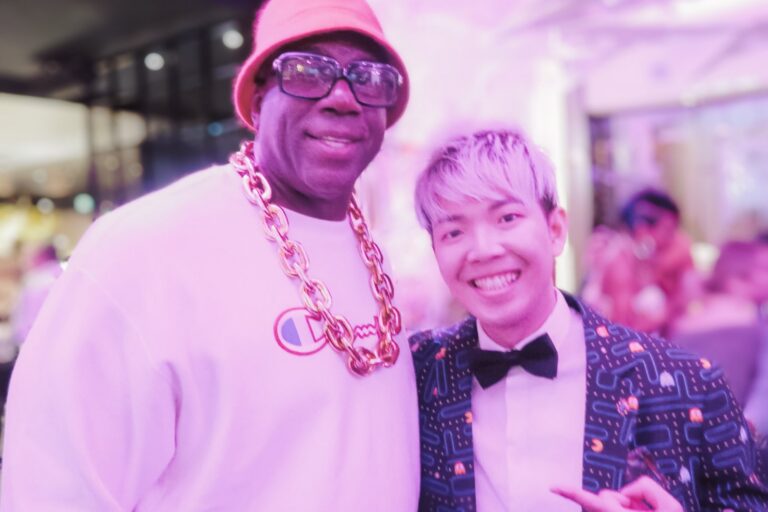 Johnny Wu with a celebrity guest after a private event