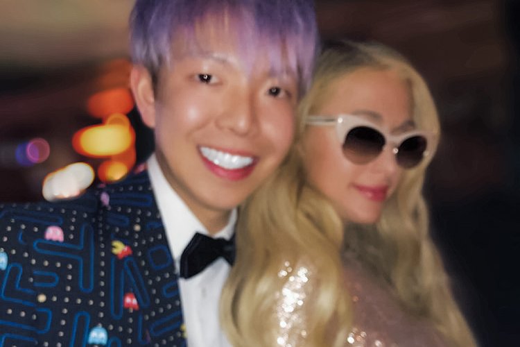 Johnny Wu with a celebrity guest after a private event
