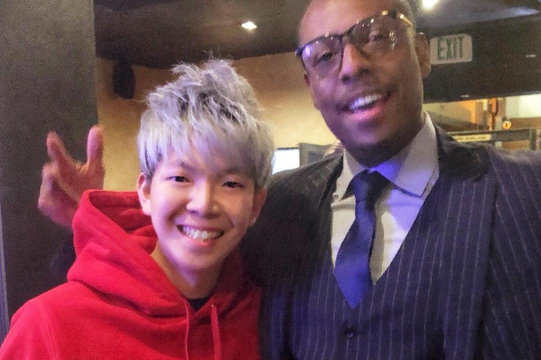 Johnny Wu with a celebrity guest after a private event