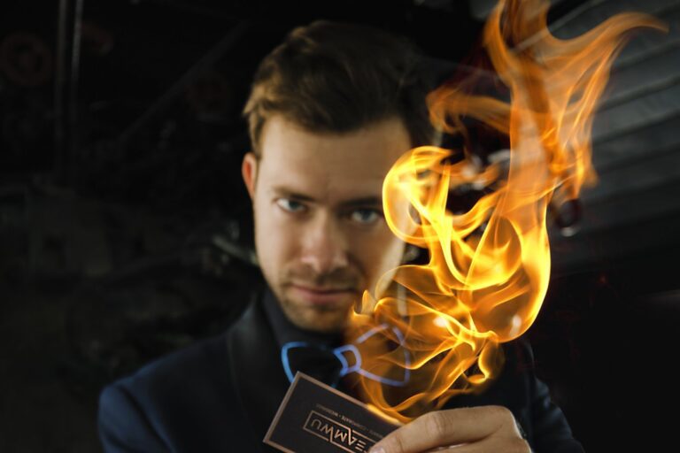 Omni Magic magician Dylan performing a card trick