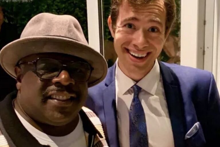 Omni Magic magician Dylan with a celebrity guest after a private event