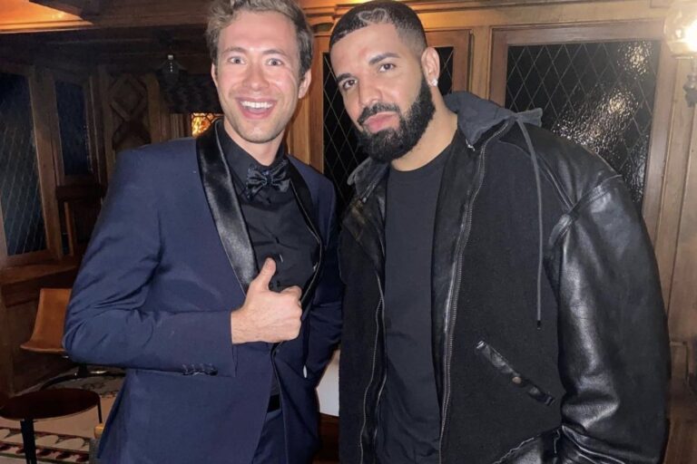 Omni Magic magician Dylan with a celebrity guest after a private event
