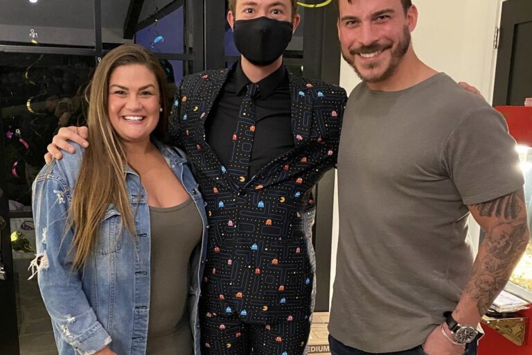 Omni Magic magician Dylan with a celebrity guest after a private event