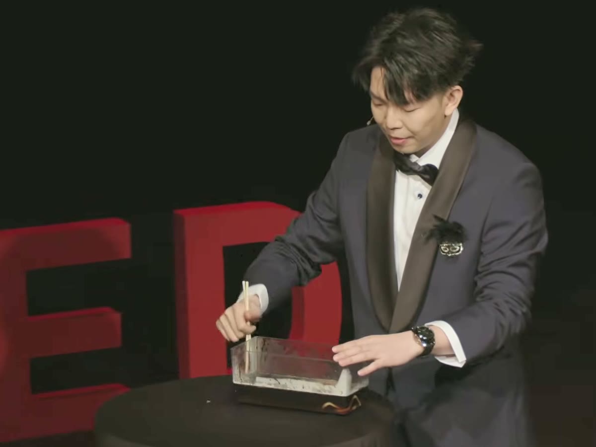 Johnny Wu on the TEDx stage